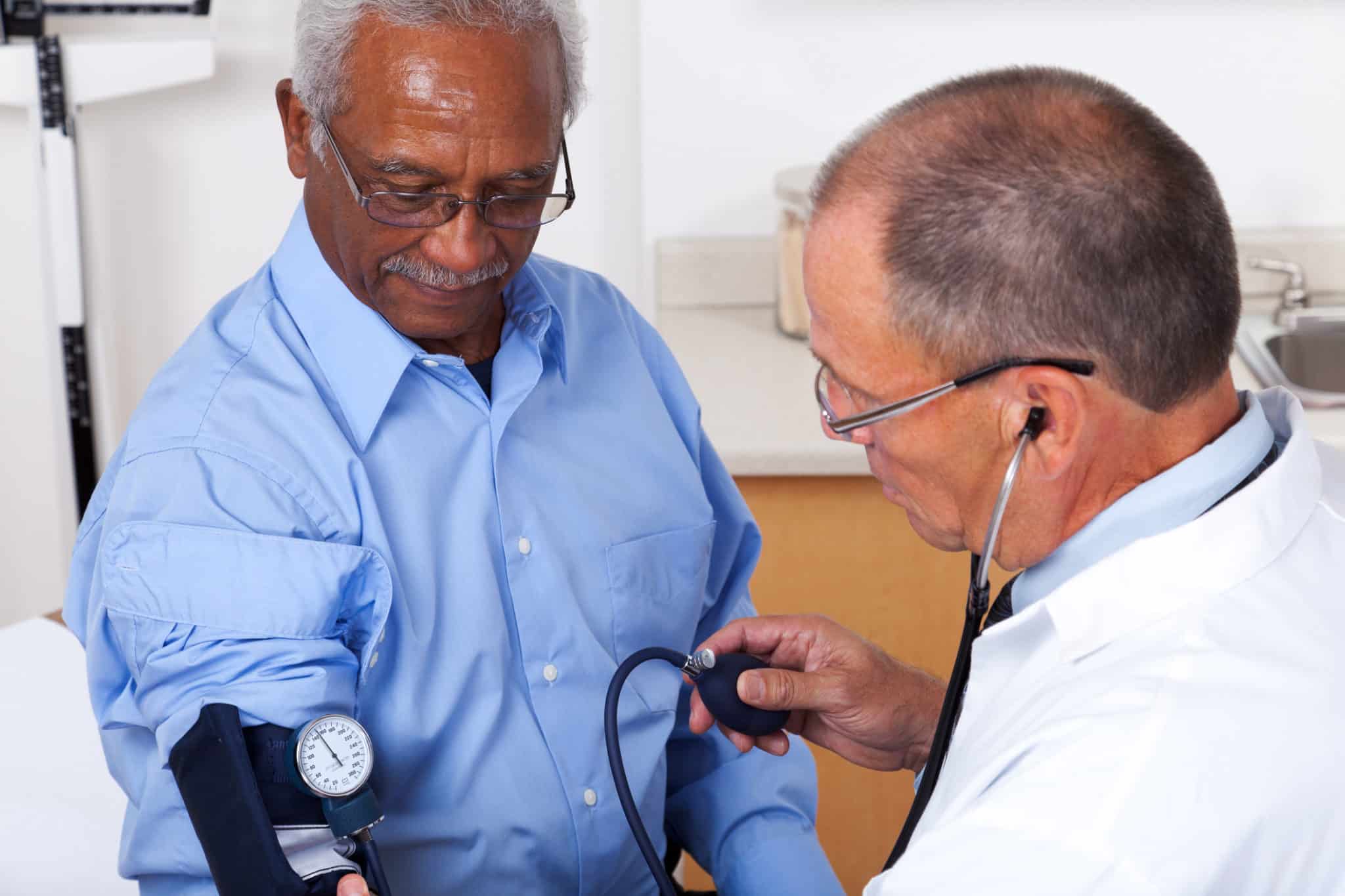 Doctor Checking Blood Pressure