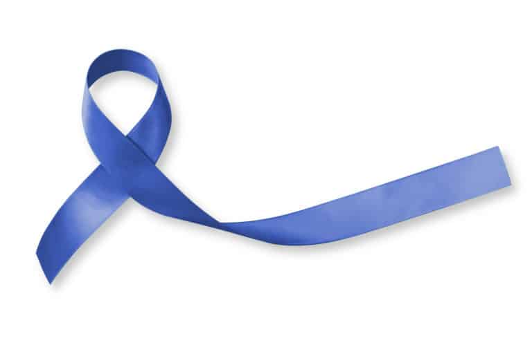 Colorectal/ Colon cancer, Acute Respiratory Distress Syndrome (ARDS), and Tuberous Sclerosis awareness symbolic with dark blue ribbon with dark blue ribbon on white background with clipping path