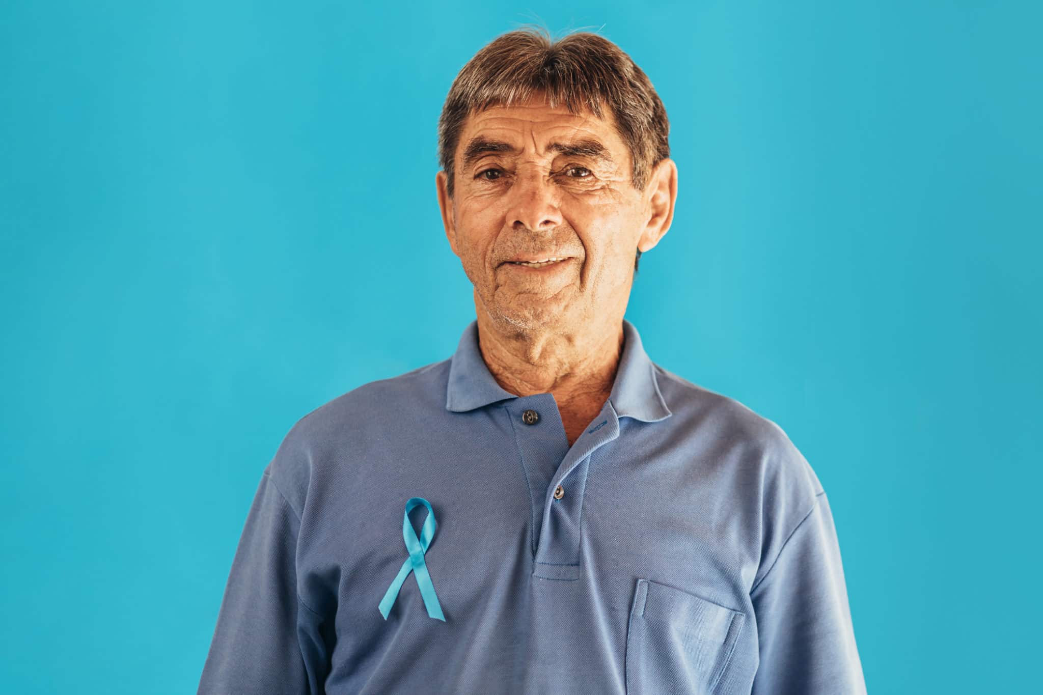 Prostate Cancer Awareness. Man with light Blue Ribbon for supporting people living and illness. Men Healthcare and World cancer day concept