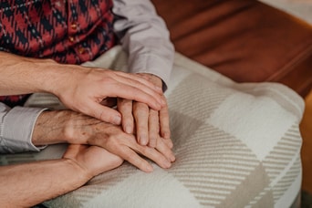 Comforting Elderly Senior Man Hands Close Up. Giving Care.