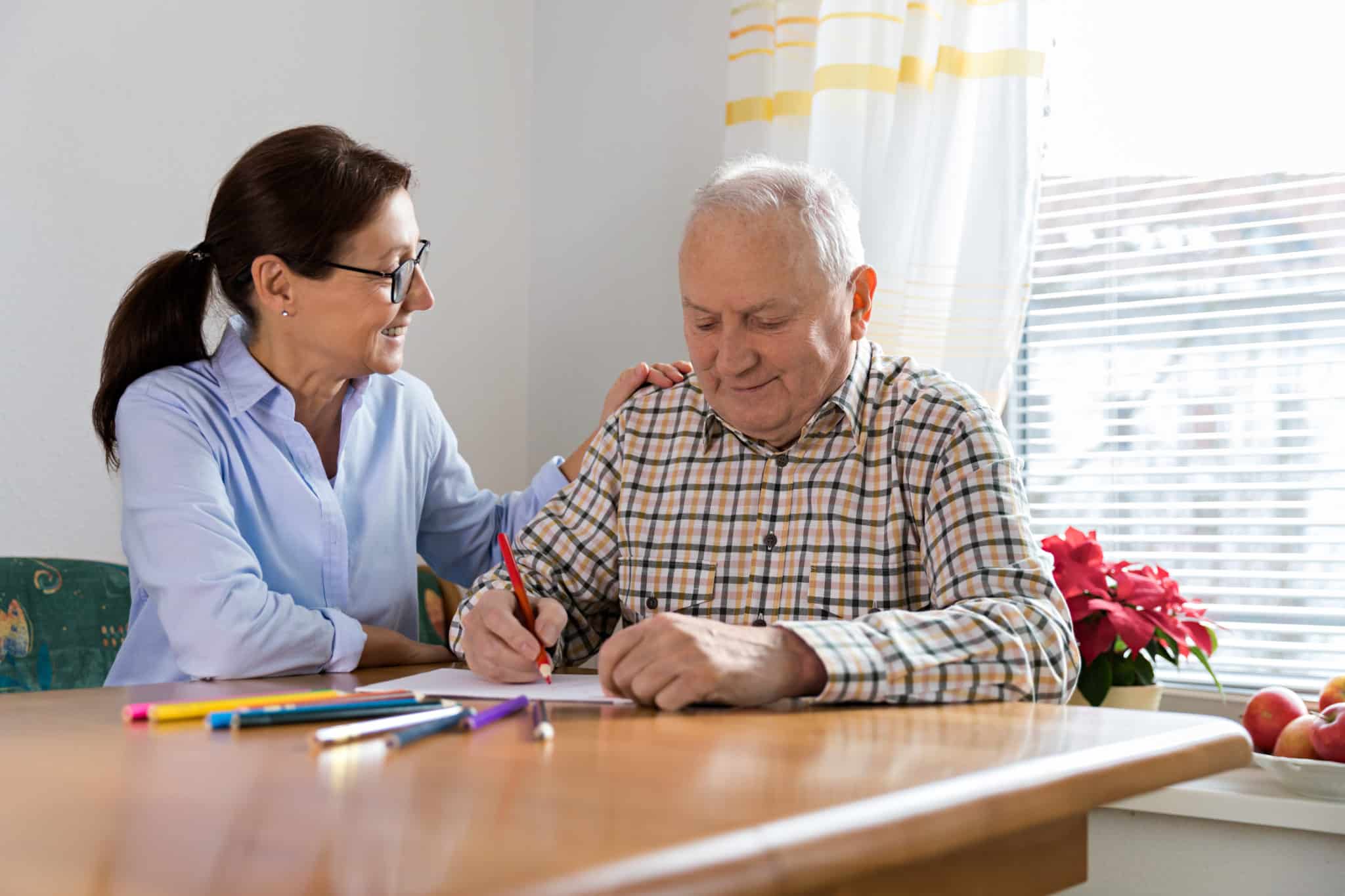 Dementia and Occupational Therapy - Home caregiver and senior adult man