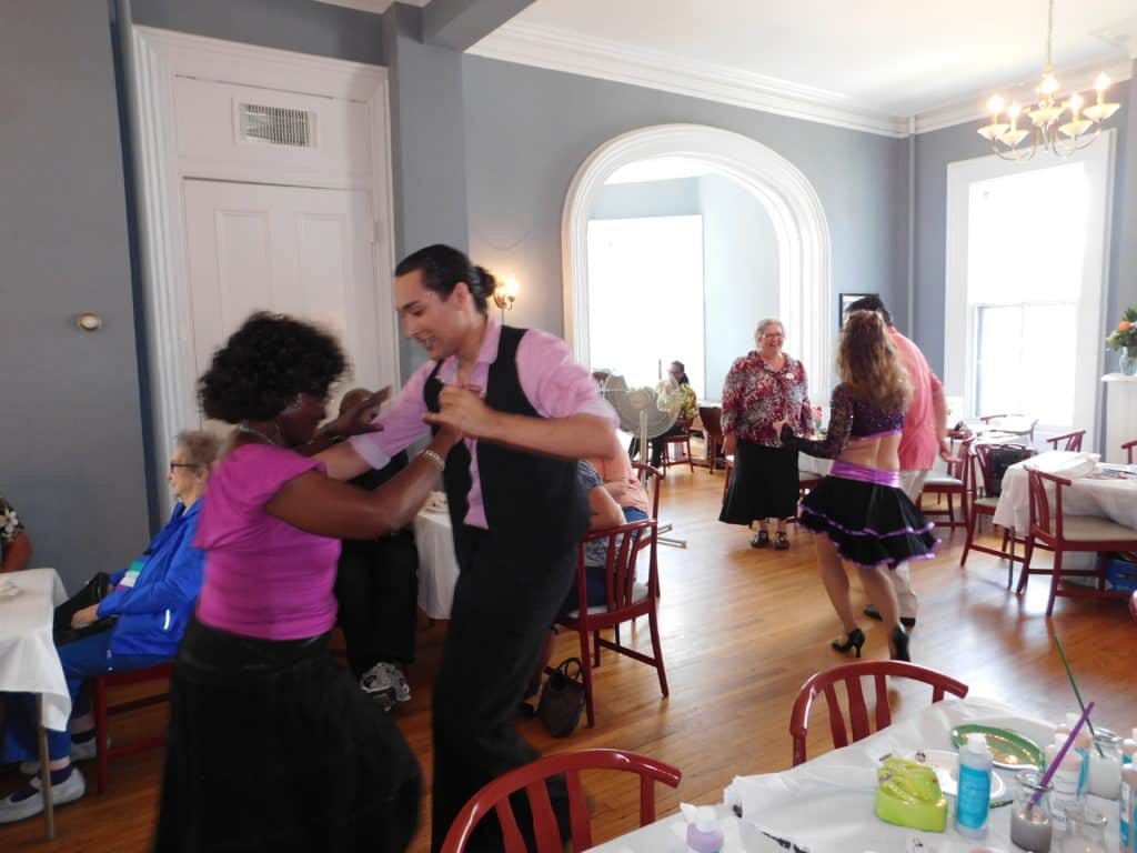 Learning to dance the rumba and tango enlivens the day.