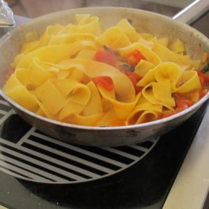 Fresh, homemade pappardelle in red sauce